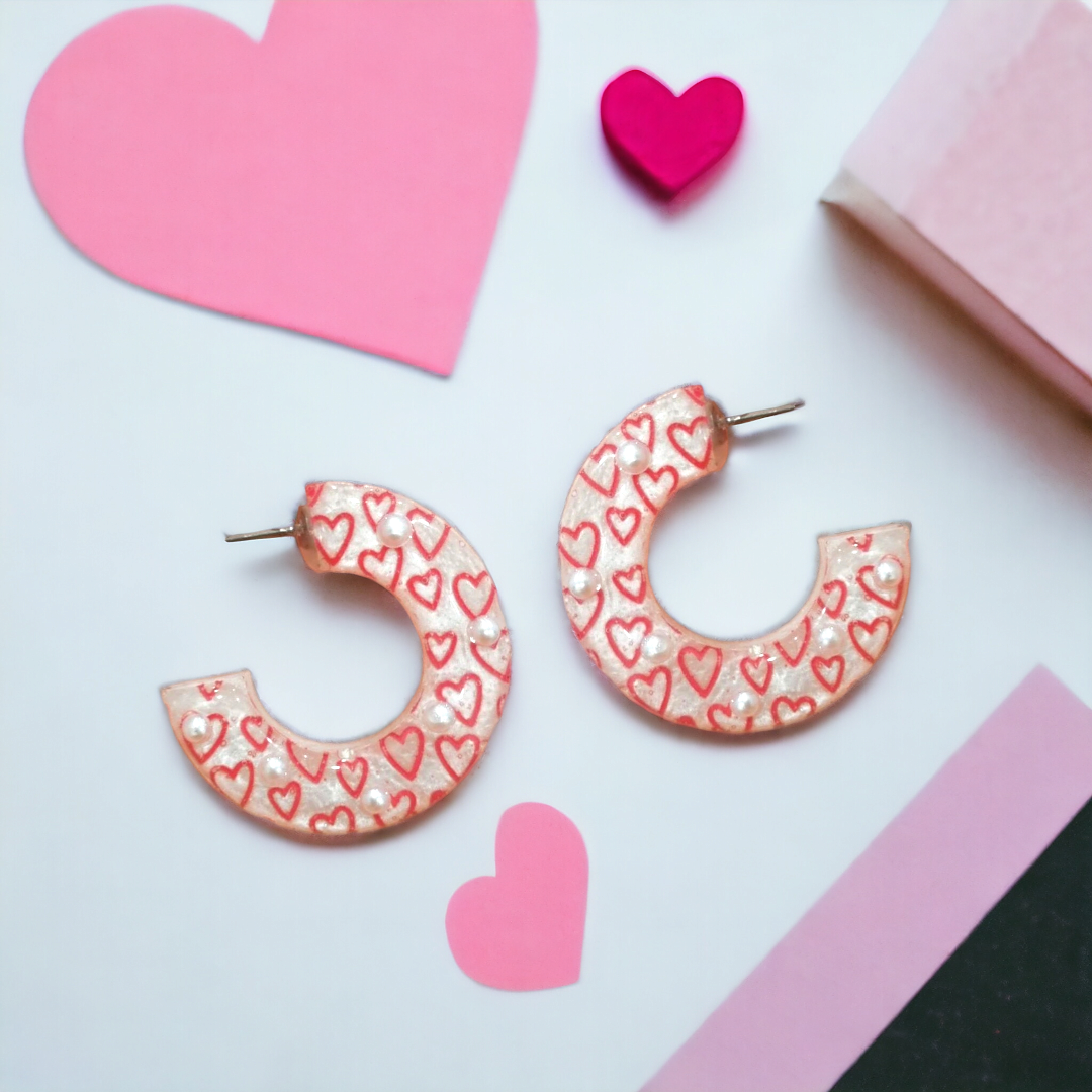 Chunky pearly white and red heart with faux pearl detail hoop earrings
